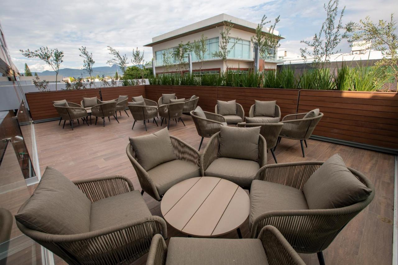 Metria Hotel Leon Exterior photo Rooftop lounge