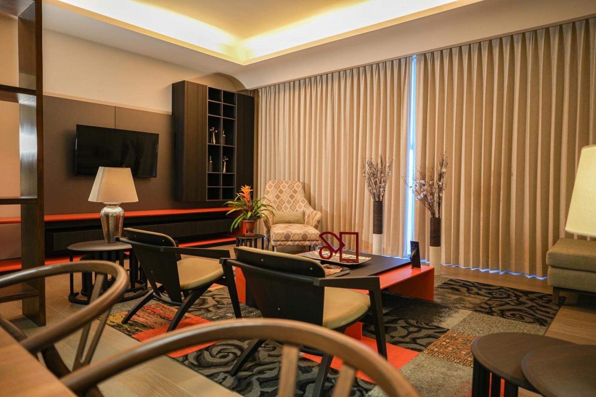 Metria Hotel Leon Exterior photo A living room in a condominium